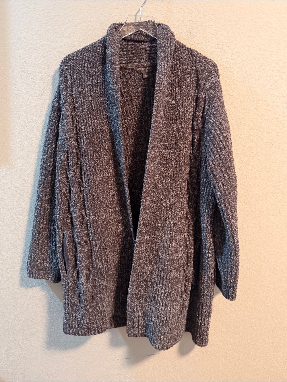Barefoot Dreams features a thick, plush knit construction and an open-front